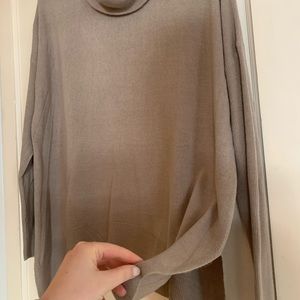 Rubbed tan cowl neck sweater.